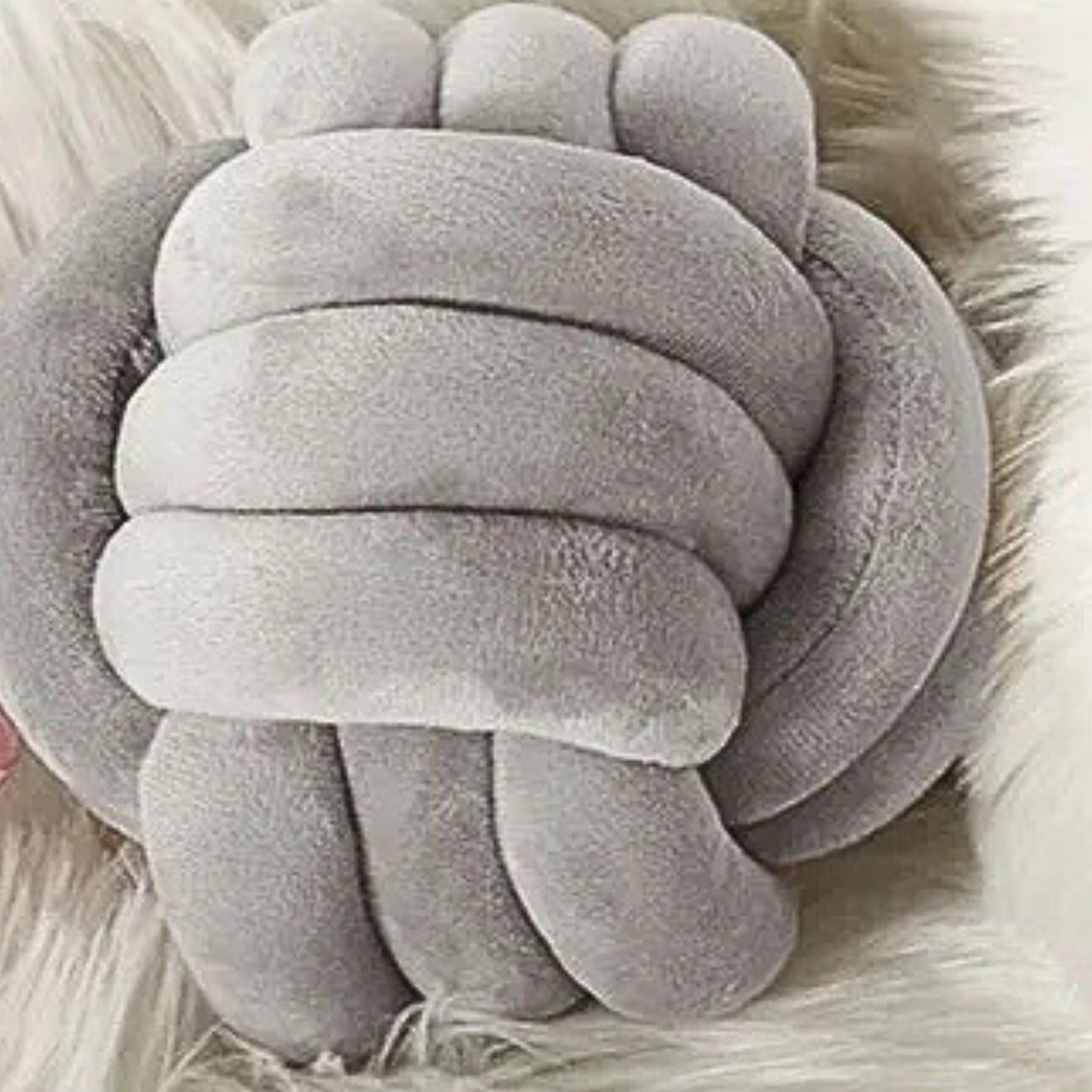 Coussin canapé rond et noué
