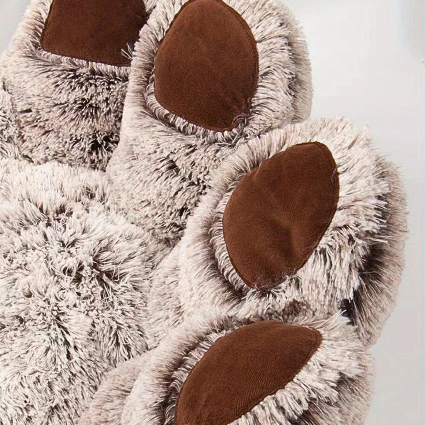 Coussin chien moelleux en patte d'ours
