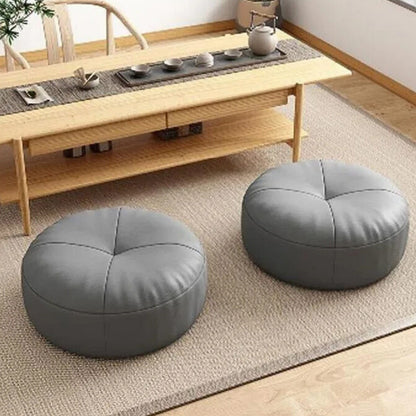 Coussin rond en cuir