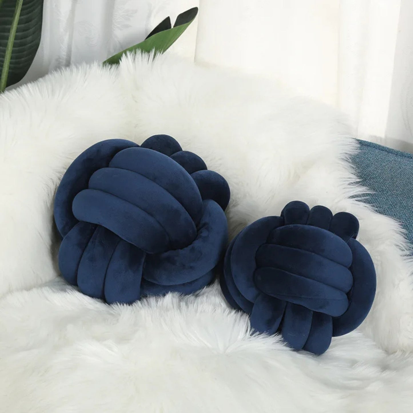 Coussin rond noué