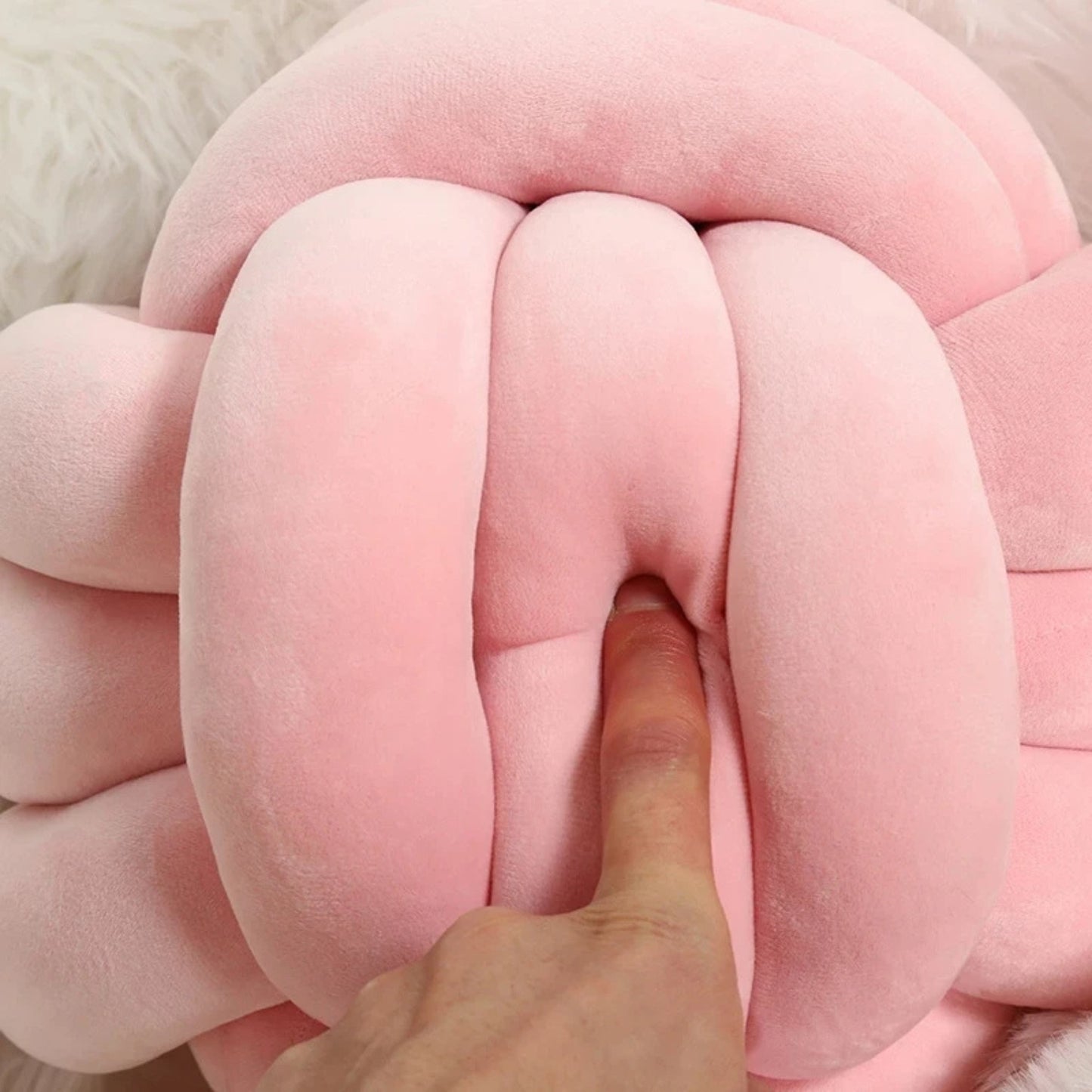Coussin rond noué
