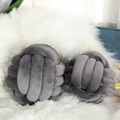 Coussin rond noué